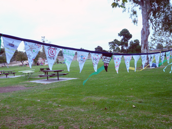 Painted Onesie Birthday Banner Bunting Hanging Outside
